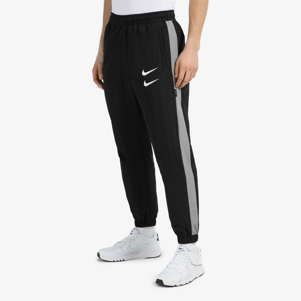 Мужские брюки Nike Sportswear Swoosh - фото 1