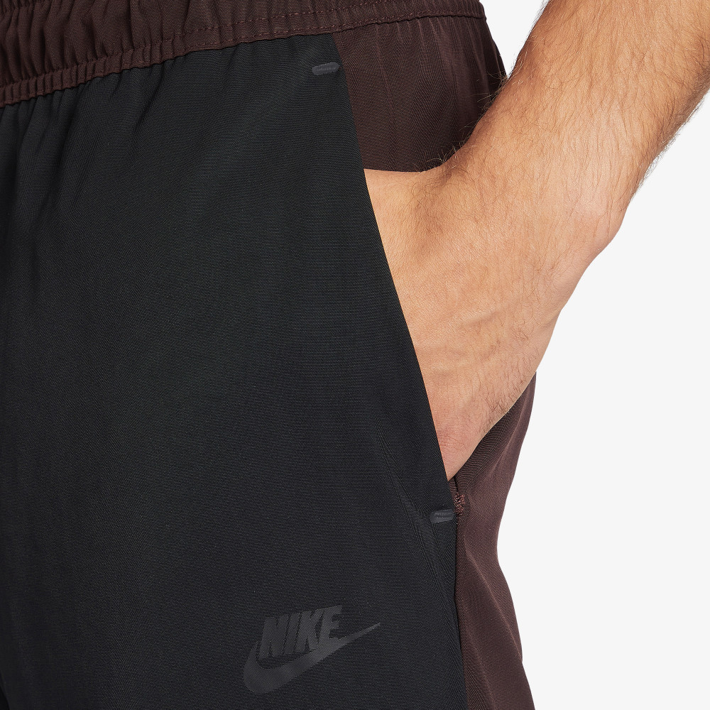 Мужские брюки Nike Sportswear Tech Essentials - фото 4