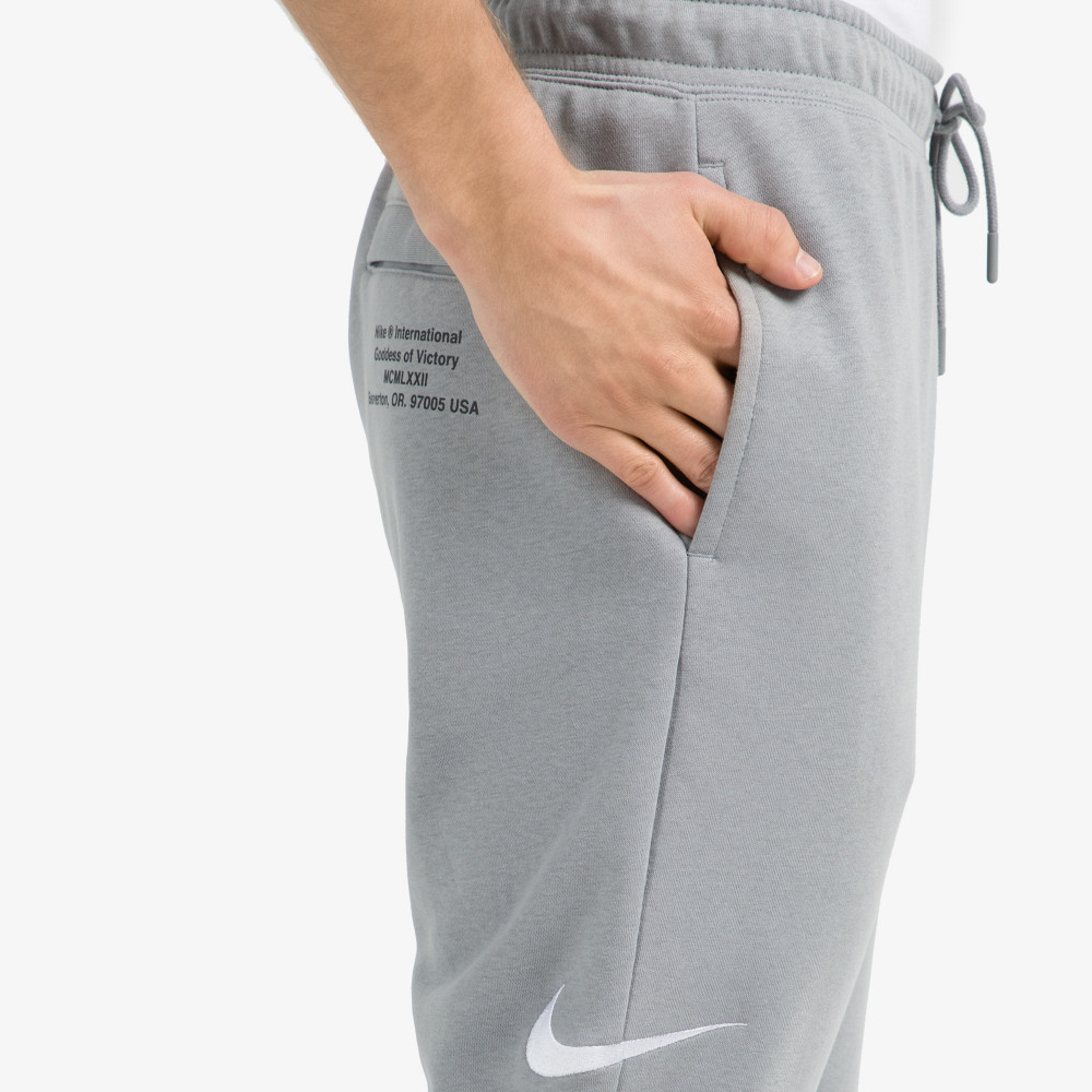 Мужские брюки Nike Sportswear Swoosh - фото 6
